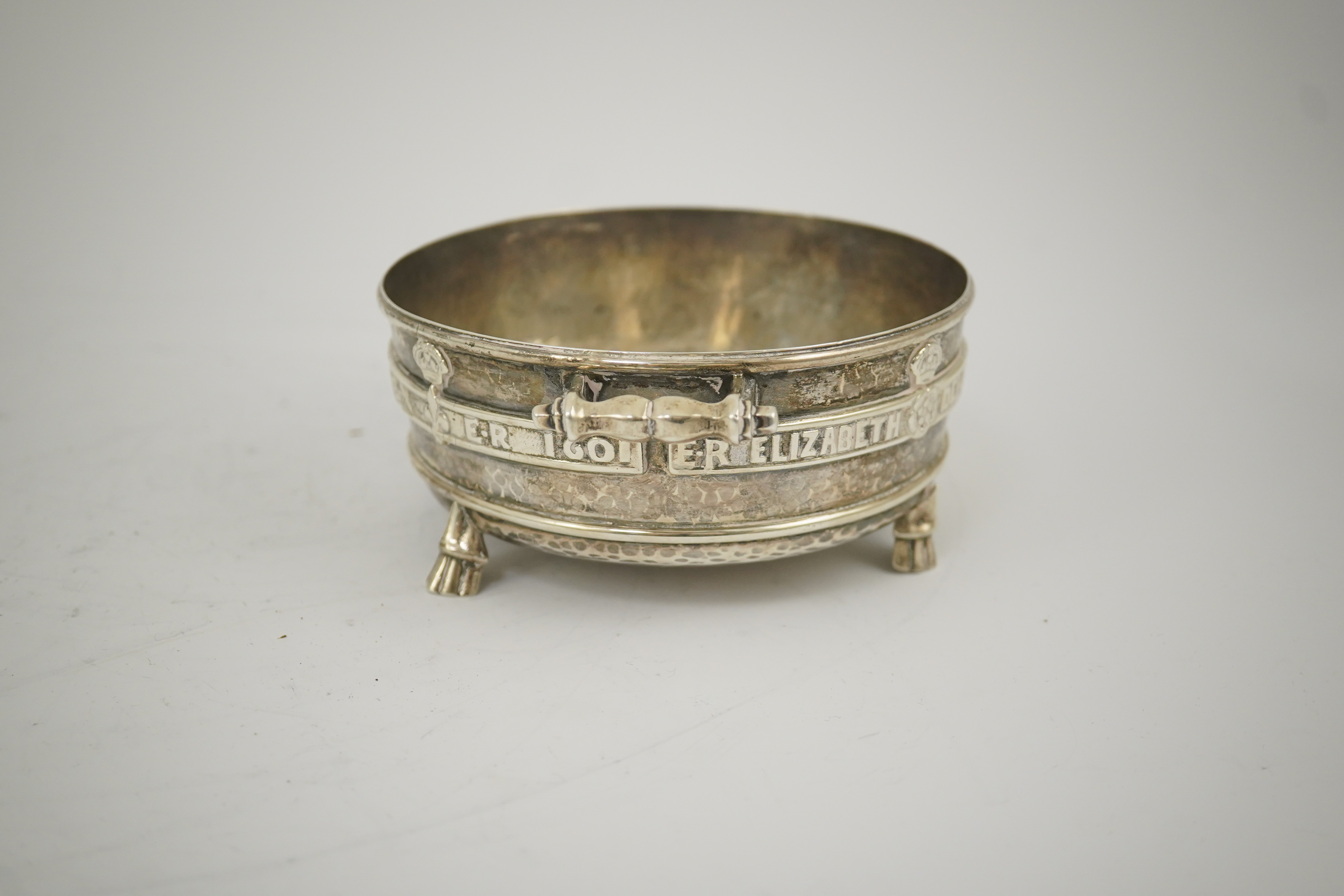 A George V Arts & Crafts planished silver replica of a late 15th century Winchester Bushel measure, by Albert Edward Jones